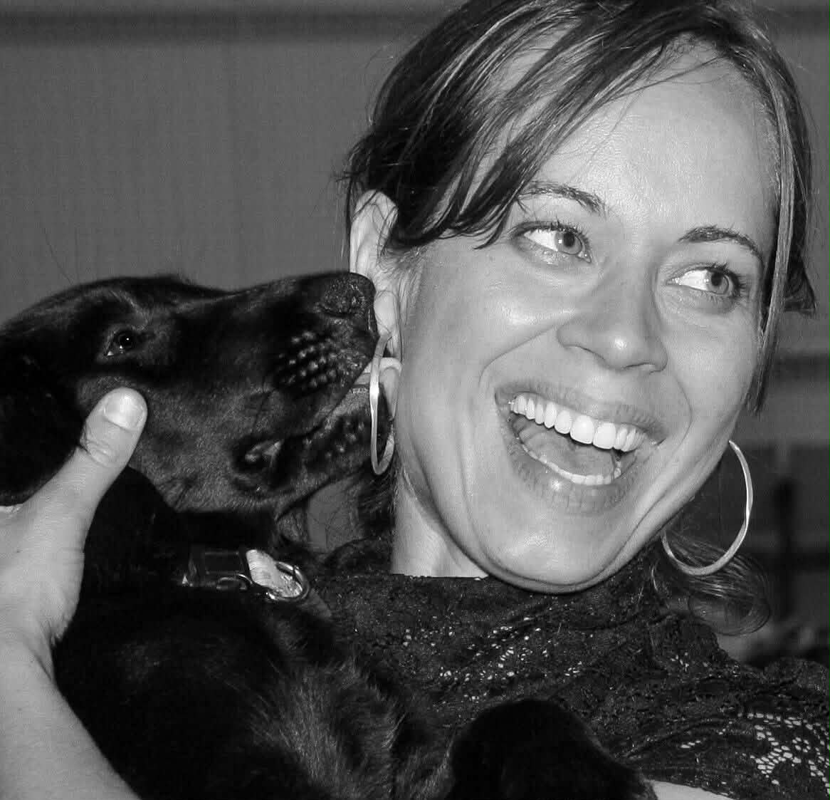 Jess Sedivy Gunderson and flat coated retriever puppy